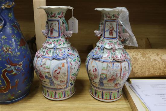 A 19th century Chinese blue ground dragon vase and a pair of famille rose vases tallest 36cm